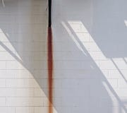 White Wall with Rust Streak and Shadow. stock photography White Wall with Rust Streak and Shadow. stock photography