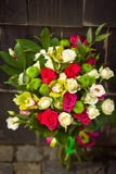 White wedding bouquet with pink roses and yellow orchids stock photo White wedding bouquet with pink roses and yellow orchids stock photo