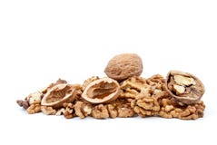 Whole and cracked walnuts, nutshells, kernels. Whole and cracked walnuts with nutshells over kernels isolated on the white background royalty free stock photo Whole and cracked walnuts, nutshells, kernels. Whole and cracked walnuts with nutshells over kernels isolated on the white background royalty free stock photo