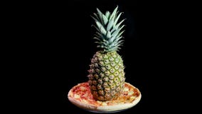 Pizza Spinning with a Whole Pineapple on Top Stock Video - Video of  controvery, dividing: 221335665
