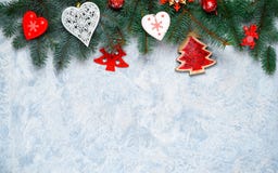 Christmas border isolated, composed of fresh fir branches and ornaments in red and white royalty free stock photo Christmas border isolated, composed of fresh fir branches and ornaments in red and white royalty free stock photo