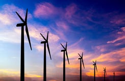 Wind Turbine Silhouette On Colorful Sunset Royalty Free Stock Photos