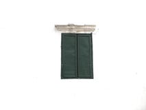 Green window on white cement background stock image Green window on white cement background stock image