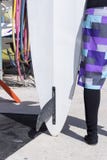 Windsurf board and a surfer girl Stock Images Windsurf board and a surfer girl Stock Images