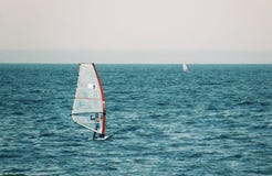 Windsurfer In The Sea, Autumn Windsurfing, Selective Focus Royalty Free Stock Photos