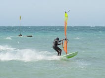 Windsurfer rides in the Black sea. Anapa, Russia royalty free stock photos Windsurfer rides in the Black sea. Anapa, Russia royalty free stock photos