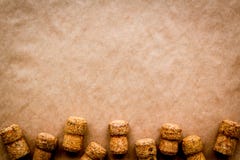 Wine bottle corks pattern on craft paper background top view copyspace. New Year celebration concept Royalty Free Stock Photo Wine bottle corks pattern on craft paper background top view copyspace. New Year celebration concept Royalty Free Stock Photo
