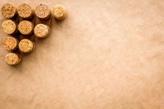 Wine bottle corks pattern on craft paper background top view copyspace. New Year celebration concept Royalty Free Stock Photo Wine bottle corks pattern on craft paper background top view copyspace. New Year celebration concept Royalty Free Stock Photo