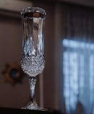 Wineglass drink indoors close-up celebration window wall. Wineglass water reflection celebration close-up day window shadow Royalty Free Stock Photos Wineglass drink indoors close-up celebration window wall. Wineglass water reflection celebration close-up day window shadow Royalty Free Stock Photos