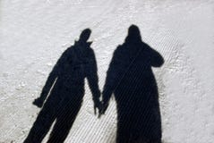 Winter couple shadow Royalty Free Stock Photo Winter couple shadow Royalty Free Stock Photo