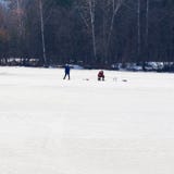 Winter fishing. River, lake near forest in ice. Anglers, Fishermens during your favorite leisure time. Copy space stock photography Winter fishing. River, lake near forest in ice. Anglers, Fishermens during your favorite leisure time. Copy space stock photography