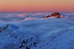 Winter High Tatras Mountain Range Panorama With Many Peaks And Clear Sky. Sunny Day On Top Of Snowy Mountains. Stock Photo
