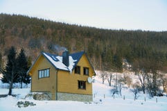 Winter house in the mountains stock image Winter house in the mountains stock image