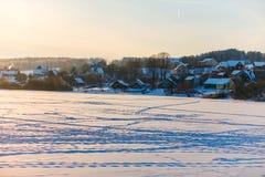 Winter landscape. Frozen lake covered with snow. Life in village stock image Winter landscape. Frozen lake covered with snow. Life in village stock image
