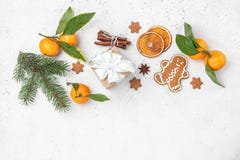 Winter Or Christmas Decoration Symbols. Tangerines, Gingerbread, Fir Tree, Cinnamon, Gift Box Stock Photo