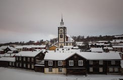 Winter in Roros, original mining town. Snow covered roofs of old royalty free stock photo Winter in Roros, original mining town. Snow covered roofs of old royalty free stock photo