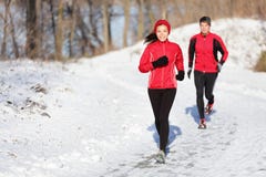 Winter running exercise couple stock images Winter running exercise couple stock images
