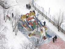 Winter, urban courtyard, children playground, people royalty free stock photo Winter, urban courtyard, children playground, people royalty free stock photo