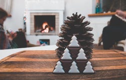 winter vintage rustic decorations with pine cone and christmas tree chocolate stock images winter vintage rustic decorations with pine cone and christmas tree chocolate stock images