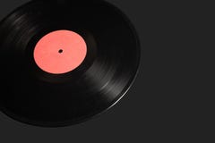 Winylowego rejestru lp albumowy dysk, odosobniony długiej sztuki dysk z pustą etykietką w czerwieni fotografia royalty free Winylowego rejestru lp albumowy dysk, odosobniony długiej sztuki dysk z pustą etykietką w czerwieni fotografia royalty free