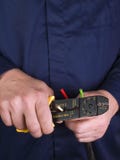 Wire stripper in the hands Royalty Free Stock Photography Wire stripper in the hands Royalty Free Stock Photography