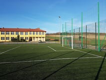 Wisniowa, Poland - 9 9 2018:An open stadium in the courtyard of a village school. Eduction of the younger generation. Sports groun royalty free stock photo Wisniowa, Poland - 9 9 2018:An open stadium in the courtyard of a village school. Eduction of the younger generation. Sports groun royalty free stock photo