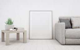 Witte lege kaderspot omhoog op houten vloer met concrete muurachtergrond, Bank en lijst dichtbij lege affiche in heldere woonkame stock fotografie Witte lege kaderspot omhoog op houten vloer met concrete muurachtergrond, Bank en lijst dichtbij lege affiche in heldere woonkame stock fotografie