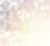 Witte zilveren en gouden abstracte bokehlichten De achtergrond van Defocused stock fotografie Witte zilveren en gouden abstracte bokehlichten De achtergrond van Defocused stock fotografie
