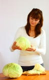 Woman And Cabbage Royalty Free Stock Photo