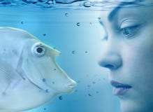 Woman And Fish Royalty Free Stock Photography Woman And Fish Royalty Free Stock Photography
