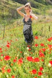Woman And Poppies Royalty Free Stock Photo