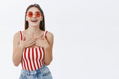 Woman being delighted with glory and fame standing grateful and pleased with attention smiling joyfully holding palms on royalty free stock photos Woman being delighted with glory and fame standing grateful and pleased with attention smiling joyfully holding palms on royalty free stock photos