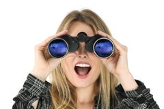 Woman with binoculars looking shocked