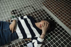 Woman in Black and White Striped Long-sleeved Top Lying on Black Net stock photo Woman in Black and White Striped Long-sleeved Top Lying on Black Net stock photo