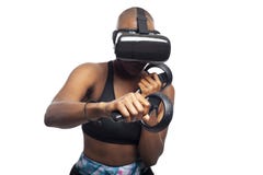 Woman Boxing in VR with a Virtual Reality Headset and Controllers stock photo Woman Boxing in VR with a Virtual Reality Headset and Controllers stock photo