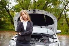 Woman with a broken car Stock Photos Woman with a broken car Stock Photos