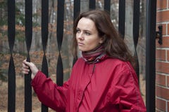 Woman By The Gate Royalty Free Stock Photo Woman By The Gate Royalty Free Stock Photo