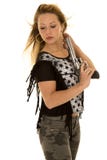 Woman camo pants star shirt gun look back stock photography Woman camo pants star shirt gun look back stock photography