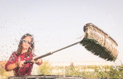 Woman at car wash station - Inside view stock photos Woman at car wash station - Inside view stock photos