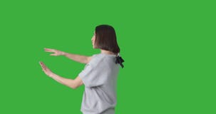 Woman dancing and walking backwards