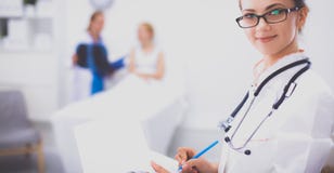 Woman doctor standing at hospital Royalty Free Stock Photos Woman doctor standing at hospital Royalty Free Stock Photos