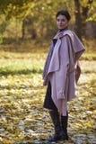 A woman dreams in an autumn park stock images A woman dreams in an autumn park stock images