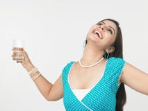 Woman Drinking A Glass Of Water Stock Photography