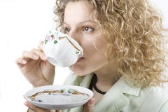 Woman Drinks From A Cup Royalty Free Stock Photos