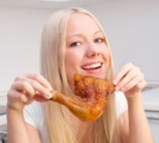 Woman Eating Chicken Stock Photography