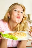 Woman Eating Spaghetti Stock Photo