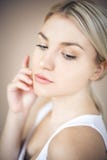 Beautiful woman with cream dots on the face. royalty free stock images Beautiful woman with cream dots on the face. royalty free stock images