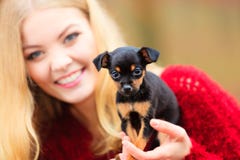 Woman embrancing her puppy dog stock image Woman embrancing her puppy dog stock image