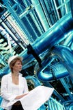Woman Engineer Against Pipes Royalty Free Stock Image Woman Engineer Against Pipes Royalty Free Stock Image