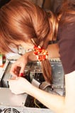 Woman Engineer Is Repairing Computer Royalty Free Stock Photos